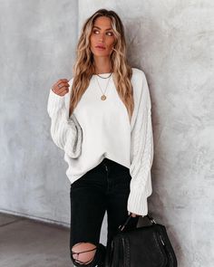 Our braided sleeve sweater is a pure white tone in a lovely relaxed fit. This snug knit is sure to keep you warm as it features a high neckline and drop-shoulder long sleeves. Pair with jeans for a lazy day outfit. Size Guide: Ambre is 5’2” tall, and has a 33.2” bust, 24.5”waist, & 36.7” hips. She is wearing a S / US 4 / AU 8. This sweater is true to size. Feature: Relaxed fit. Unlined. Crew neckline. Braided sleeve details. Material: 100% Acrylic. Care Instructions: Machine wash / Cold hand was Lazy Day Outfit, White Tone, Lazy Day, Daily Dress, Dress Jewelry, Day Outfit, Sweater Sleeves, Sleeve Detail, White Sweaters