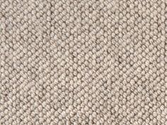 the texture of an upholstered carpet is shown in light gray and white colors