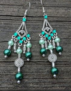 These beautiful green Chandelier statement earrings get a lot of attention.  This unique pair of Earrings are made with silvertone materials.  Be sure to check out my other items too.  I have amazing deals in my CLEARANCE EARRINGS section! Check them out. Green Chandelier Earrings, Green Chandelier, Green Chandeliers, Chandelier Earrings, Earring Gifts, Statement Earrings, Silver Tone, Jewelry Earrings, Gifts For Her