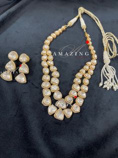 Silver Mossanite Polki Set Jewelry |Indian Wedding Jewelry Set | Polki Set | Indian Traditional Jewelry | Wedding jewelry | Pendant set Material : Silver Gemstone: Mossanite Polki Primary colour: Gold Earring Closure: Screw back and clips Size- Earring : width: 30mm Length: 50mm Nacklace: 285mm Pendant: Width: 30mm Length: 30mm Silver Intricate, hand crafted, Pure Silver Polki Necklace and Earring Set, studded with high quality Mossanite Polki and Earring comes with screw back and clips , made i Gold Crystal Jewelry Sets For Reception, Crystal Gold Jewelry Sets For Receptions, Festive Crystal Jewelry Sets For Wedding, Traditional White Jewelry Sets For Anniversary, Crystal Kundan Necklace With Stone Work For Wedding, Hand Set Crystal Kundan Wedding Necklace, Hand Set Crystal Kundan Necklace For Wedding, Hand-set Crystal Kundan Necklace For Wedding, Dazzling Kundan Necklace For Wedding