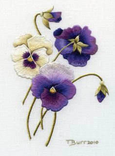 some purple and white flowers on a white background with the words burrrio written in gold