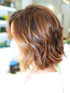 the back of a woman's head with short hair