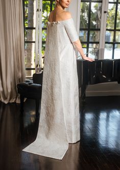 Known for using exquisite textiles from the finest European mills, Barbara Tfank’s ready-to-wear and bridal collections are classic and timeless in French brocades, Italian silks, intricate jacquards, and more. Product Details Care Instructions Dry-clean only. Size & Fit This item fits true to size. Shipping Details This item is made-to-order. Please allow 8-10 weeks for production and 5-7 business days for standard delivery. Return Policy This item is final sale and not available for return. Barbara Tfank, Bridal 2024, Haute Couture Bridal, Drop Waist Gown, Satin Gowns, Organza Gowns, Couture Bridal, Column Gown, White French