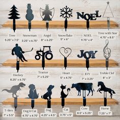 the silhouettes of people and animals are displayed on wooden shelves with numbers, shapes, and symbols