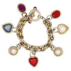 Givenchy Vintage 1980s Gripoix Pearl Heart Oval Red Blue Purple White Bracelet. Gold Tone. Good condition. Some light scratches or colour loss, especially at the chain. 100% genuine. Toggle clasp is outfitted with two red glass cabochon endings. Givenchy logo hang Tag is missing. Size: 20 cm. Pendant: 2.5*2 cm. Weight: 95 g. _ _ _ Great for everyday wear. Come with velvet pouch and beautiful package. Makes the perfect gift for Teens, Sisters, Friends, Girlfriends, Birthdays, Anniversaries, Mothe Givenchy Bracelet, Givenchy Logo, Givenchy Women, White Bracelet, Vintage Charm Bracelet, Pearl Heart, Bee Pendant, Hand Bracelet, White Bracelets