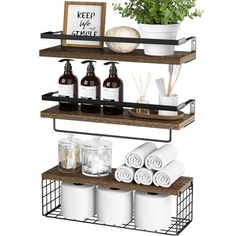 three shelves with bottles, soaps and other items on them in front of a white background