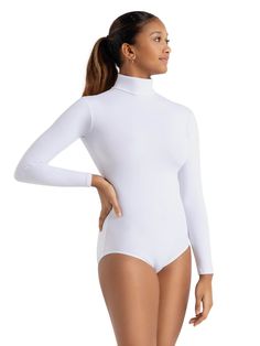 Team Basics Turtleneck Long Sleeve LeotardCreate beautiful lines with modesty and elegance in the Turtleneck Long Sleeve Leotard. This leotard features a modest turtleneck and zippered back for easy dressing. Made of a soft and resilient nylon and spandex blend, this leotard is perfect for cold studio days and layering under cheer and sports uniforms.Product Features:90% Nylon, 10% SpandexTurtleneck necklineBack zipperLong sleeveNot linedBallet leg lineRecommended care: Machine wash cold, delica Ballet Legs, Long Sleeve Leotard, One Piece Clothing, Turtleneck Long Sleeve, Sports Uniforms, Easy Dressing, Womens Turtleneck, Beautiful Lines, Coco Chanel