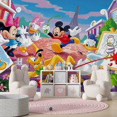 a living room with mickey mouse and other cartoon characters on the wall, including an easel