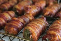 bacon wrapped hotdogs on a rack ready to be eaten