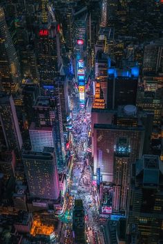 an aerial view of new york city at night from the top of the empire building