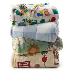 stack of baby blankets on top of each other