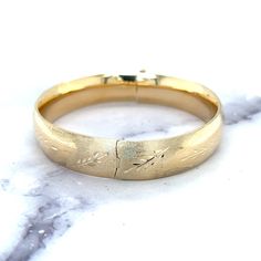 ➣ High quality 14K Yellow Gold 13.5mm Floral Leaf Bangle, Floral Pattern, 7" 8" Bangle, Stackable Bracelet, Real Gold Bangle, Women  ➣ MATERIAL: 14K Yellow Gold    ➣ Weights:  7" - 19.20 gram 8" - 20.50 gram  ◈ Please note that weights are approximate.  ➣ If you need a specific length, please message us.  ➣ SHIPPING: ◈ We always offer domestic FREE SHIPPING via USPS first class (3-5 business days)  ◈ We ship internationally, shipping costs are shown at checkout.     Please be aware that the buye Gold Vermeil Jewelry, Stackable Bracelets, Gold Bangle, Pure Gold, Gold Bangles, Real Gold, Gold Vermeil, Beautiful Jewelry, Gold Filled