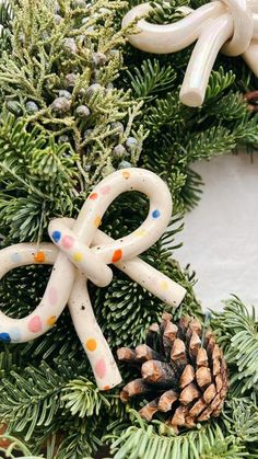 a close up of a wreath with decorations on it