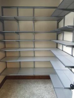 empty shelves in a room with carpeted flooring