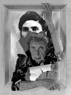 an old woman with torn up photos in front of her face and hands on the frame