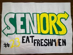 a sign that says seniors eat freshmen