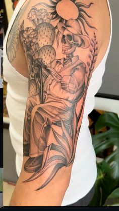 a woman with a tattoo on her arm and the image of a man sitting in a chair