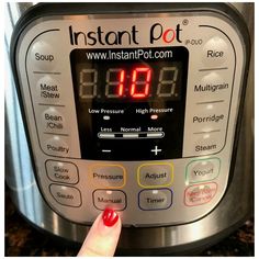 an instant pot is shown with the timer on