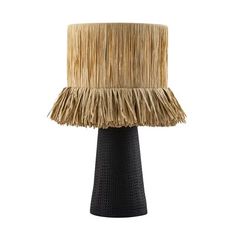 a lamp that has some kind of straw on it's base and is black