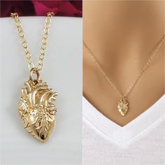 "Anatomical Heart Necklace.  This beautiful anatomical heart necklace features an Italian bronze anatomical heart charm on a 14k gold filled flat cable chain.  The highly detailed heart charm features lifelike heart details, from the four chambers to all the arteries and veins.   The flat cable chain is very pretty, as it catches the light and gives the chain the little shimmer. The high quality anatomical heart charm measures .79 x .39\" (20mmx10mm). Charm is not 3D, but is flat on the back, so Human Heart Necklace, Realistic Heart, Anatomical Heart Necklace, Arteries And Veins, Anatomical Heart, Dope Jewelry, Handmade Wire Jewelry, Chain Extenders, Jewelry Lookbook