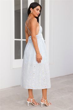 Length from shoulder to hem of size S: 94cm. Chest: 35cm, Waist: 34cm, across front only of size S. Midi dress. Semi-lined. Model is a standard XS and is wearing size XS. True to size. Non-stretch. Embroidered design, cream stitching. V-neck. Open back, crisscross tie. Zipper. Print placement may vary. Cold hand wash only. Polyester. A dreamy style made for you. The Pastel Paradise Embroidered Midi Dress features a gorgeous open back with a crisscross tie, a flowy skirt and an embroidered detail Dreamy Style, First Day Outfit, Dress Date Night, Midi Dress Blue, Color Crema, Embroidered Midi Dress, Bridal Shower Dress, Shower Dresses, Jumpsuits And Romper