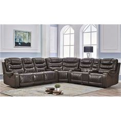 a large sectional couch in a living room