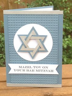 a card with an image of the star of david