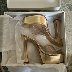 Transparent Toe With Gold Heel. New In Box, Never Worn. Size 8 Modern Clear Heels For Party, Clear Platform Heels For Party, Modern Clear Platform Heels, Gold Heels With 4-inch Open Heel, Gold Synthetic Wedge Sandals With 4-inch Heel, Block Heel Mules, Gold High Heel Mules With 4-inch Heel, Crystal Sandals, Nude Sandals