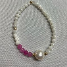 Freshwater Pearl & Pink Agate Elastic Bracelet Center Freshwater Pearl Sides Mother Of Pearl Brand New This Bracelet Is Made Of Gold Plated Sterling Silver Beads Freshwater Pearls And Pin Adjustable White Gemstone Bracelet, White Crystal Bracelet For Everyday Use, White Crystal Bracelet For Everyday, Elegant White Beaded Bracelets With Gemstones, Elegant White Beaded Gemstone Bracelets, Everyday White Pearl Stretch Bracelet, Elegant White Gemstone Beaded Bracelets, Everyday White Crystal Bracelet, White Pearl Bracelets With Gemstones