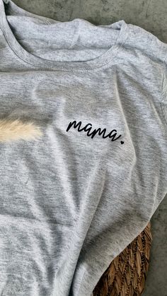 a t - shirt with the word mama written on it