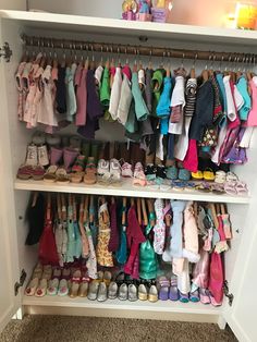 a closet filled with lots of baby shoes