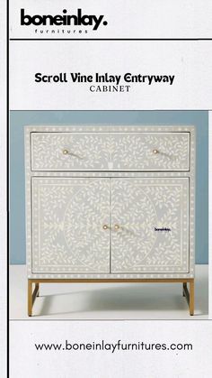 an advertisement for a cabinet that is white and has gold trimmings on it