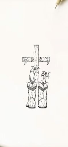 a drawing of two boots and a cross