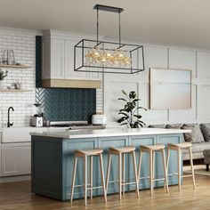 a kitchen island with stools next to it in front of a living room couch