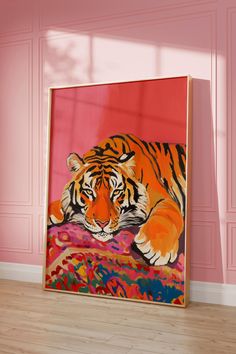 a painting of a tiger laying down on a pink blanket in front of a wall