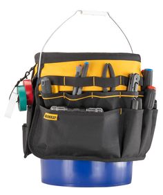 a tool bag with tools in it sitting on top of a blue barrel and white background