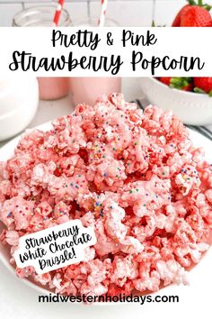 pink strawberry popcorn with sprinkles and strawberries in the background