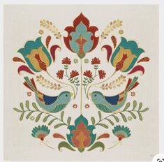 an embroidered design with birds and flowers on a white background in red, blue, green, yellow and orange colors