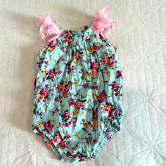 Floral Baby Girls, Dressy One Piece Bodysuit 12 To 18 Months Cotton Like New! Smoke Free Home Pink Onesie For Summer, Fitted Pink Bubble Romper For Playtime, Pink Fitted Bubble Romper For Playtime, Playful Pink Floral Print Bubble Romper, Light Blue Bubble Romper For Summer Playtime, Light Blue Sleeveless Bubble Romper For Spring, Pink Floral Print Bubble Romper For Playtime, Fitted Blue Bubble Romper, Cute Style, Fitted Blue Bubble Romper