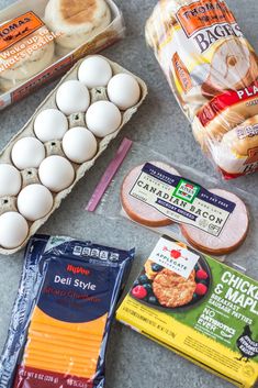 eggs, cheese, and other ingredients are laid out on the counter top to be used as an appetizer