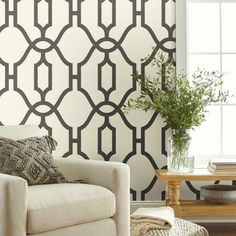 a living room scene with focus on the wallpaper