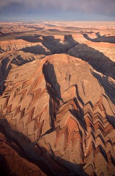 an aerial view of the desert and mountains