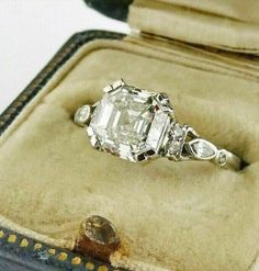 an antique diamond ring in a velvet case