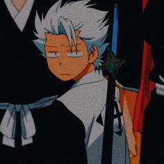 an anime character with white hair standing in front of other characters