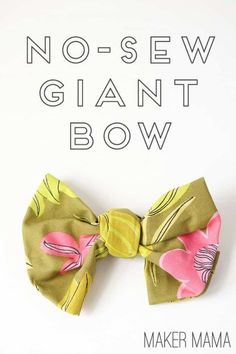 the no sew giant bow is made from fabric and has pink flowers on it