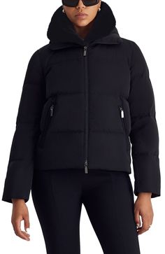 This short puffer style has a water and wind-resistant design and plush down fill to keep you cozy while you’re out and about. The zip-out hooded bib with faux mink fur lining adds an extra layer of warmth and versatility, perfect for après-ski cocktails or scenic outdoor strolls. Water & wind resistant Down fill Zip-out hooded bib with faux mink fur lining Zipper closure with snaps Filling: 80% Down, 20% Feathers Other Filling: 100% Polyester Faux Fur: 100% Polyester Outdoor Down Puffer Jacket With Faux Fur Trim, Down Puffer Jacket With Zip Fly For Cold Weather, Ski Cocktails, Puffer Style, Fitted Coat, Floral Shoes, Mens Scarves, Suit Accessories, Mink Fur