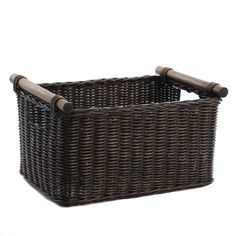 a brown wicker basket with wooden handles