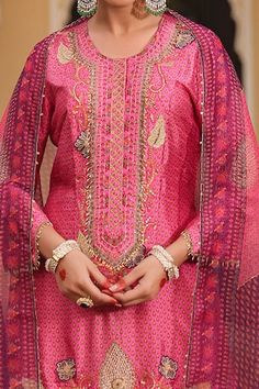 Pink kurta with tikki and pearl work on the neckline and an embroidered hemline with applique motifs highlighted with pearl, zari and resham. Paired with an embroidered sharara and dupatta. - Aza Fashions Ceremonial Sharara With Dori Work For Festivals, Ceremonial Dori Work Sharara For Festivals, Elegant Ceremonial Sharara For Eid, Traditional Sharara With Dori Work For Ceremonial Occasions, Traditional Ceremonial Sharara With Dori Work, Ceremonial Traditional Sharara With Dori Work, Ceremonial Dori Work Sharara For Diwali, Elegant Ceremonial Sets With Gota Work, Anarkali Set With Gota Work For Ceremonial Occasions