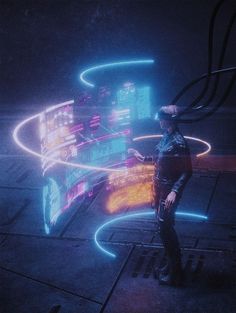 a man standing in front of a neon display