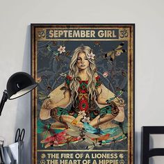 a woman is sitting in the middle of a yoga pose poster on a wall above a desk